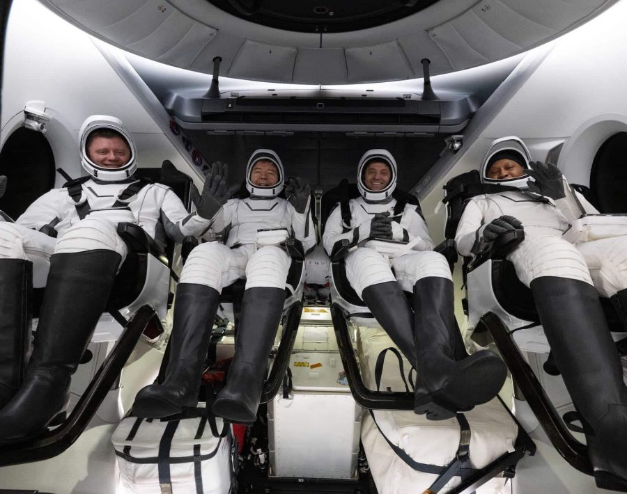 Roscosmos cosmonaut Alexander Grebenkin, left, NASA astronauts Michael Barratt, second from left, Matthew Dominick, second from right, and Jeanette Epps, right are seen inside the SpaceX Dragon Endeavour spacecraft onboard the SpaceX recovery ship MEGAN shortly after having landed in the Gulf of Mexico off the coast of Pensacola, Florida, Friday, Oct. 25, 2024. Dominick, Barratt, Epps, Grebenkin are returning after seven-months in space as part of Expedition 70 aboard the International Space Station. Photo Credit: (NASA/Joel Kowsky)