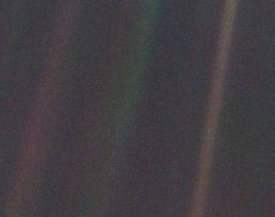 This narrow-angle color image of the Earth, dubbed 'Pale Blue Dot', is a part of the first ever 'portrait' of the solar system taken by NASAs Voyager 1.
